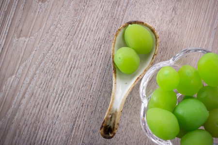 Sweet Candied Fruit on wood backgroundの写真素材