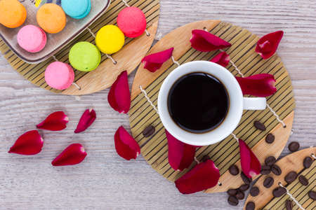 Coffee and coffee beans arranged on a wooden table, View from above with copy spaceの写真素材