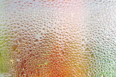 Water droplets on glass  bottle of juice background.の写真素材