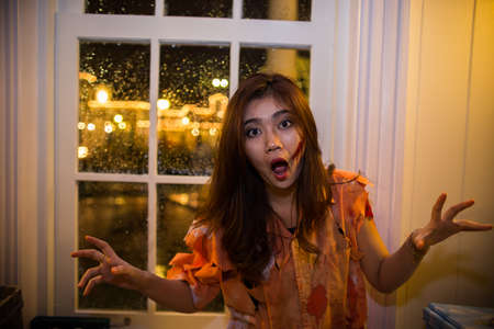 BANGKOK, THAILAND - OCTOBER 31, 2014: People take part in the Zombie at the chocolate ville park and restaurant on BANGKOK, THAILAND - OCTOBER 31, 2014.のeditorial素材