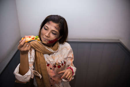 BANGKOK, THAILAND - OCTOBER 31, 2014: People take part in the Zombie at the chocolate ville park and restaurant on BANGKOK, THAILAND - OCTOBER 31, 2014.のeditorial素材