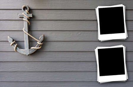 wooden anchor on wall background