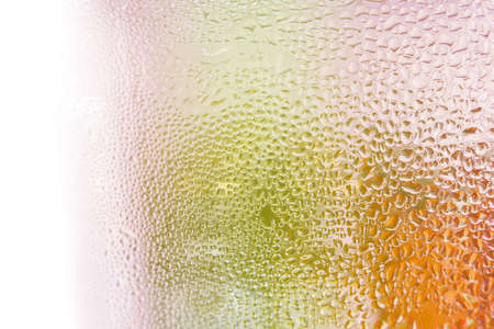 Water droplets on glass  bottle of juice background.の写真素材