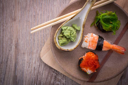japanese sushi set on old wood backgroundの写真素材