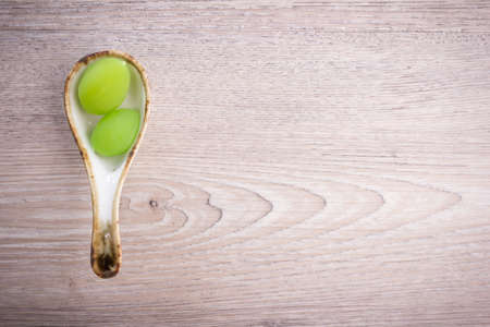 Sweet Candied Fruit on wood backgroundの写真素材