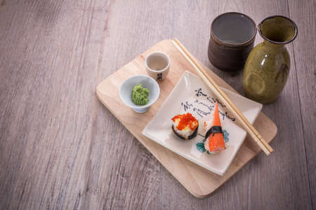 japanese sushi set on old wood backgroundの写真素材