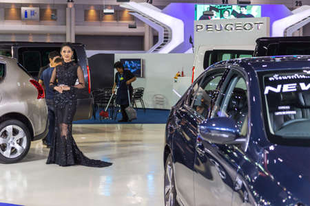 Bangkok, Thailand - December 11, 2016 : Unidentified model with Lexus car  at The 33nd Thailand International Motor Expo on  December 11,2016 in Bangkok, Thailand.のeditorial素材