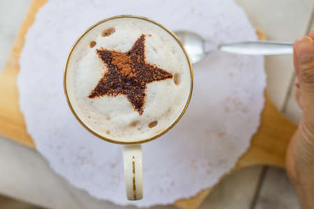 a cap of chocolate milk on top viewの写真素材