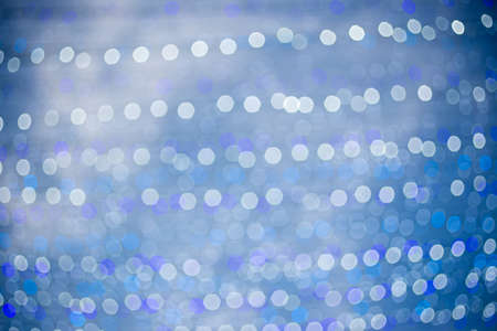 blured Christmas light  on gold abstract lights bokeh backgroundの写真素材