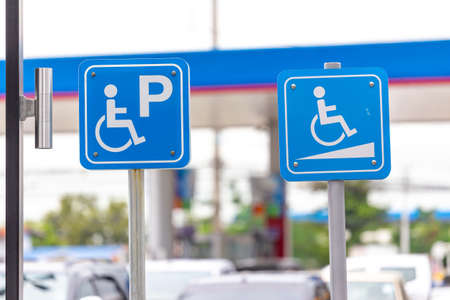 Parking for disabled guests label in gas station.のeditorial素材