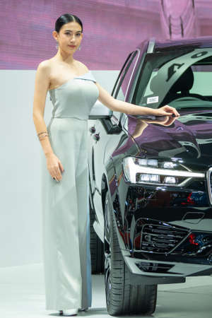 BANGKOK, THAILAND - Mar 28, 2019 : Unidentified model poses with a car at The 40th Thailand International Motor Show at IMPACT Muang Thong Thani, Bangkok, Thailand.のeditorial素材