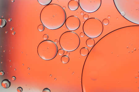 Colorful artistic of oil drop floating on the water.の写真素材