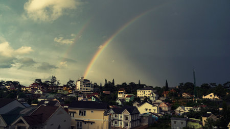 Rainbow over the city of Dalat, Vietnam.の写真素材