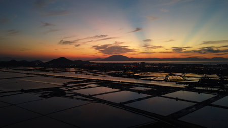 Sunset at the salt fields in Khanh hoa, Vietnam.