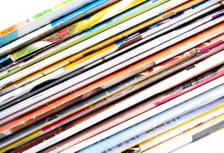 Stack of magazines isolated on white backgroundの写真素材
