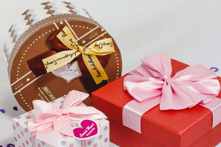 Beautiful gift boxes favorite on a white background with hearts
