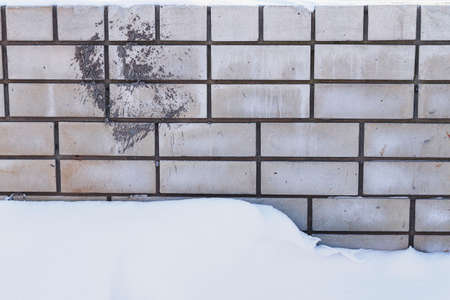 texture of white brick and snow.の写真素材