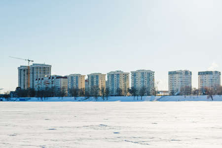 Winter landscape on a frozen riverの写真素材