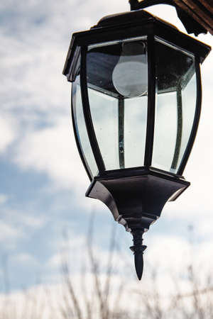 Street lamp in winter on sky backgroundの写真素材