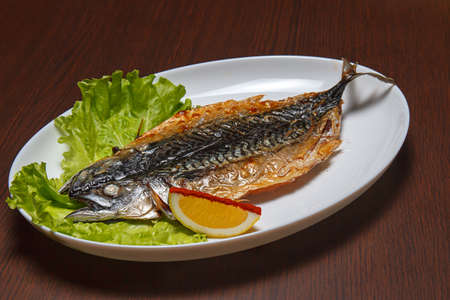 Grilled Foods - Grilled Fish with Lemon and Cherry Tomatoの写真素材