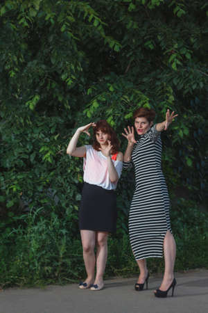 young girl in sweater posing on the street, the portrait mood,の写真素材