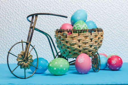 beautiful Easter eggs in a nest on a decorative bicycle