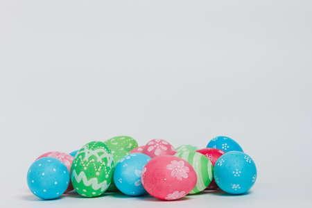 Perfect colorful handmade easter eggs isolated on a whiteの写真素材