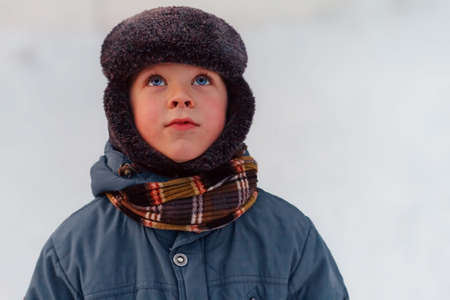 Adorable little boy skating on ice rinkの写真素材
