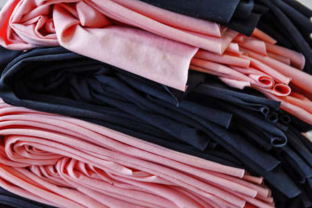 Rolls of fabric and textiles in a factory shop.の写真素材