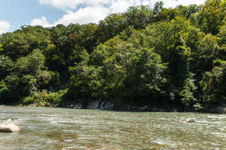 river in the mountains. mountainous area. photo on a long exposure, waterfalls in the mountains in...