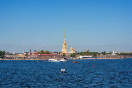 Cruise boats goes along the Neva River with a  view of the Peter and Paul fortress.のeditorial素材