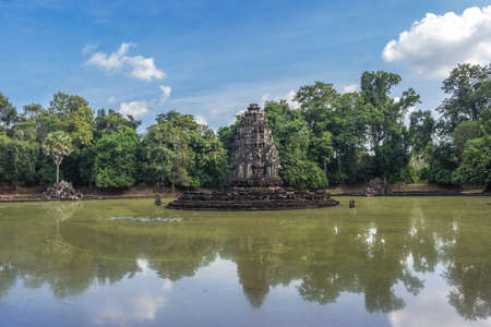 Neak Pean ("The entwined serpents") is an artificial island with a Buddhist temple on a circular island in Preah Khan Baray, Angkor. Siem Reap. Cambodia.の写真素材