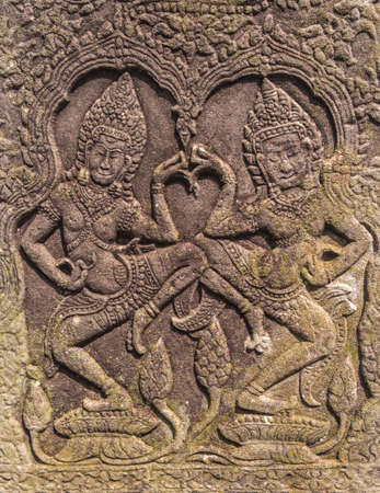 Khmer classical nymphs  and dancers shown in stone - An Apsara (also spelled as Apsarasa) in Bayon...