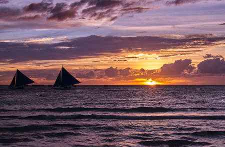 Beautiful sunset on Boracay white beach, Philippinesの写真素材