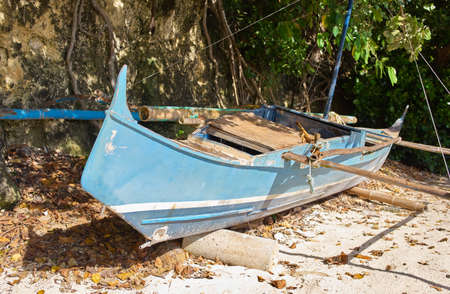 Bangka boat is standing on the beach, Philippinesの写真素材