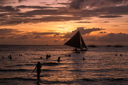 Beautiful sunset on Boracay white beach, Philippinesの写真素材