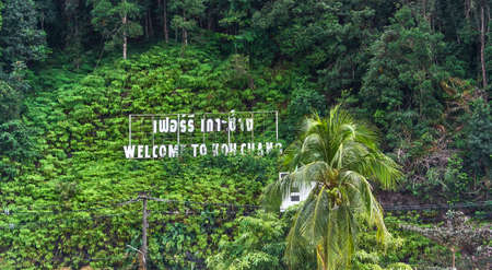 Welcome to Koh Chang text on an mountain of island, Thailand