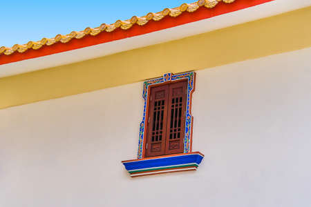 Beautiful wooden window in buddhism temple