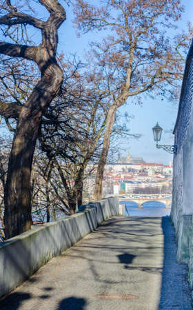 narrow path with steep stairway is leading to the vysehrad castle in prague. just opposite to the prague castle at the far end.のeditorial素材