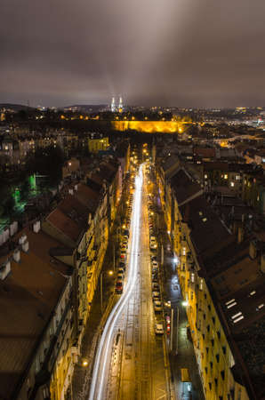 night view of vysehrad castle and surrounding area taken from the top of nuselsky bridge in prague.