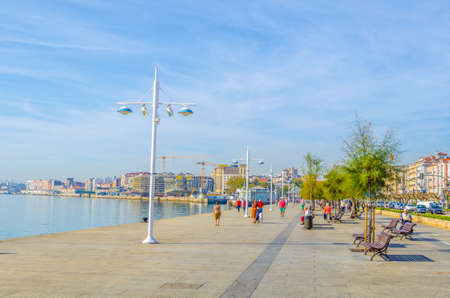 People are strolling on promenade in Santander, Spainのeditorial素材