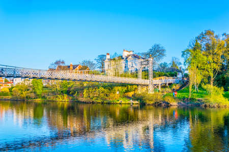 View of residential houses alongside river Dee in Chester, Englandの写真素材