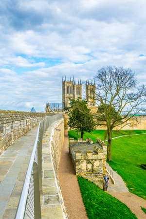 Lincoln cathedral viewed over rampart of the Lincoln castle, England
の写真素材