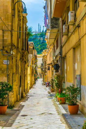 View of a narrow street in Modica, Sicily, Italyのeditorial素材