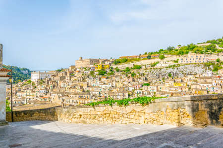 View of a stairway in Modica in Sicily overlooking city beneath itの写真素材
