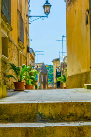 View of a narrow street in Modica, Sicily, Italyのeditorial素材