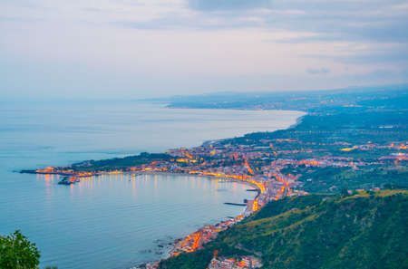 Sunset view of coastline near sicilian city Taormina, Italy
の写真素材
