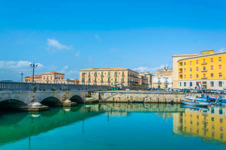Boats are moored next to the old town of Syracuse, Sicily, Italy
の写真素材