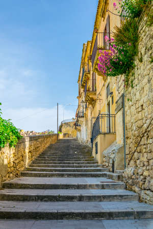 View of a stairway in Modica in Sicily overlooking city beneath it
の写真素材