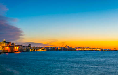 View of seaside of the sicilian city Trapani during sunset, Italy